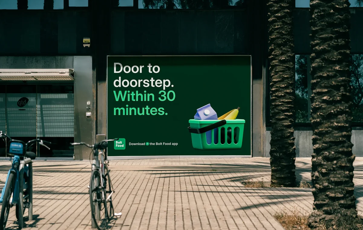 Bolt Food billboard: 'Door to doorstep. Within 30 minutes.'