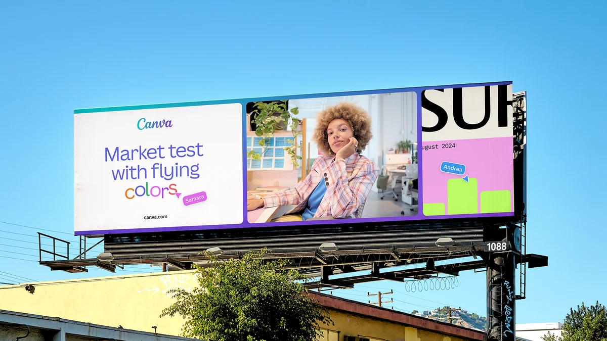Canva billboard over a city street