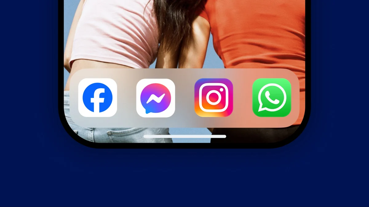 Facebook, Messenger, Instagram and WhatsApp icons in a phone dock