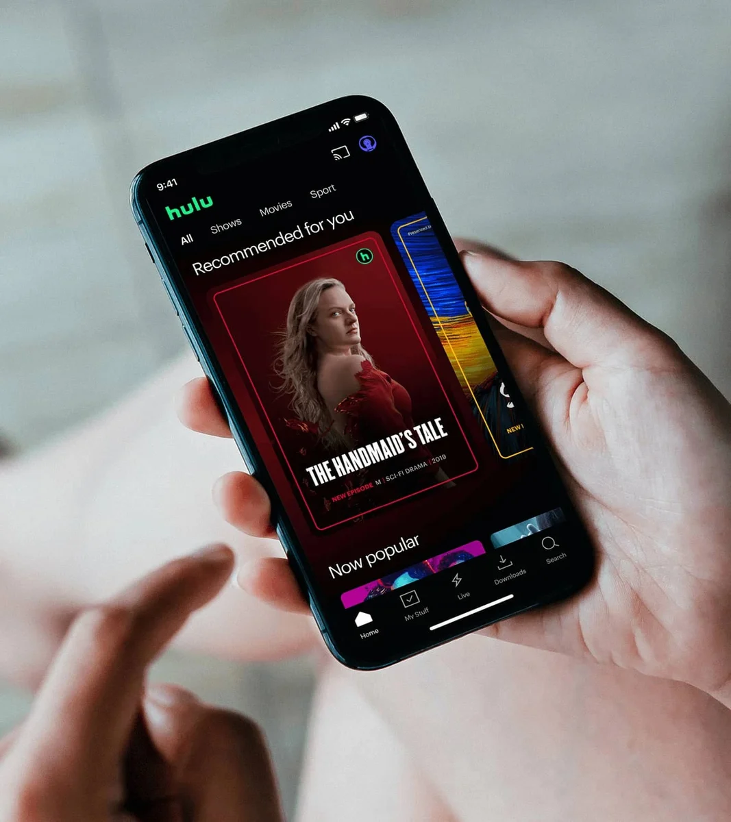 Hulu app on a phone in hand