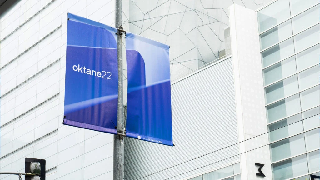 Okta Oktane banners on a building