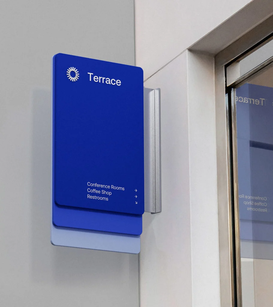 Okta wall signage in blue