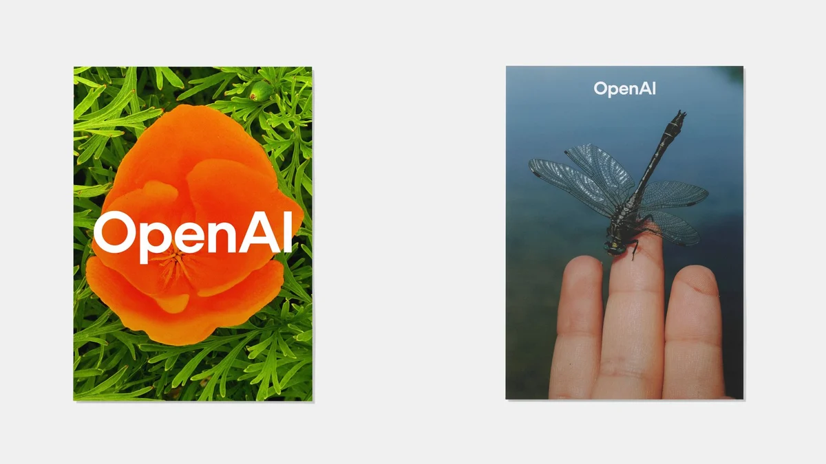 Carteles de OpenAI con una flor naranja y una mano