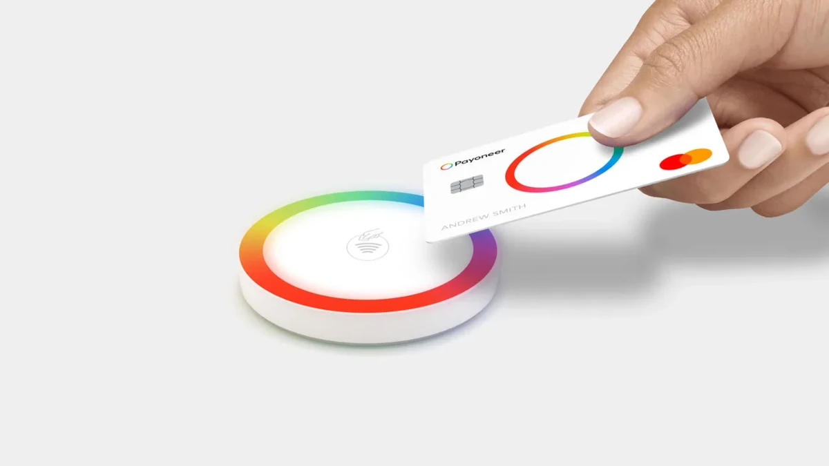Payoneer rainbow ring object in a hand
