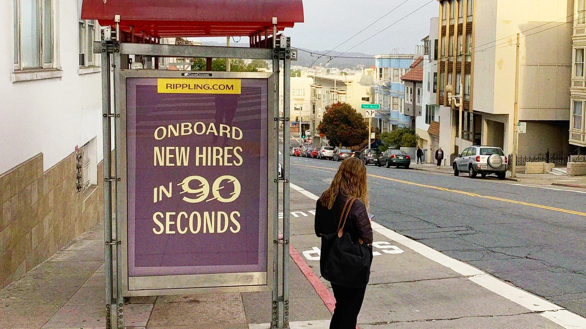 Rippling bus shelter ad: 'Onboard new hires in 90 seconds'