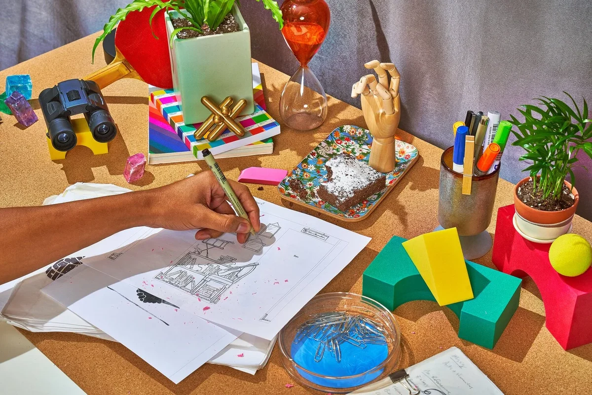 Overhead view of a creative workspace with craft materials
