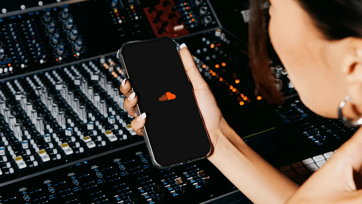 SoundCloud campaign: a phone over a mixing desk