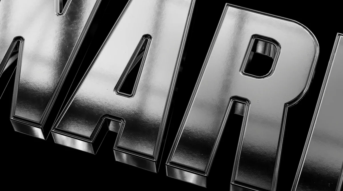 Primer plano de letras 3D cromadas sobre fondo negro