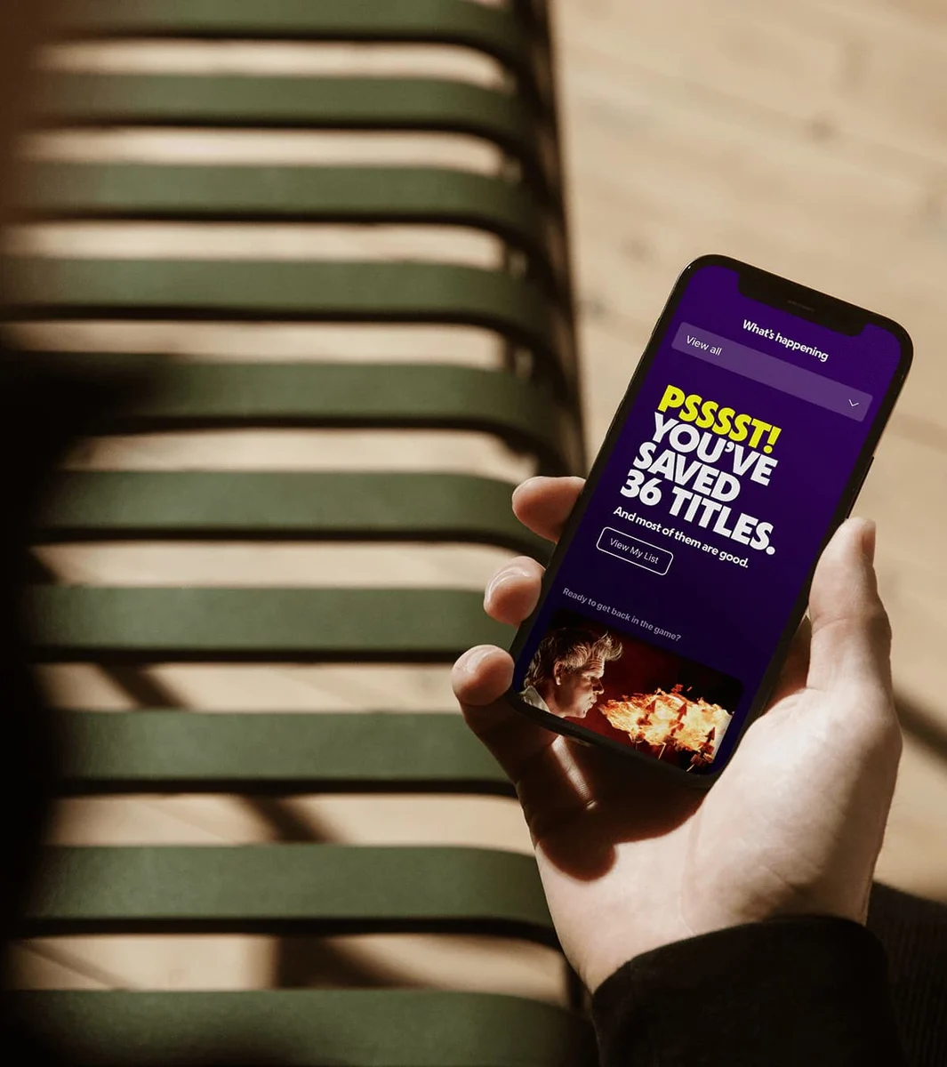 Tubi app on a phone in hand