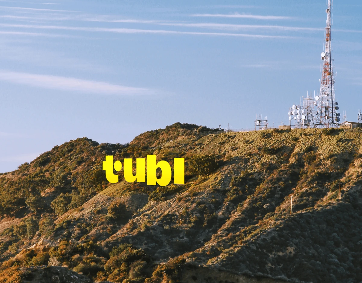 Tubi sign on a hillside, Hollywood-style