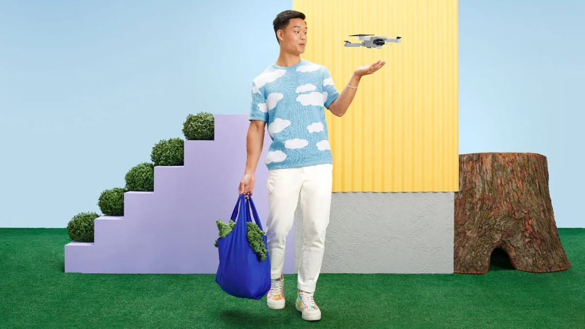 Udemy campaign image: a man on colourful steps