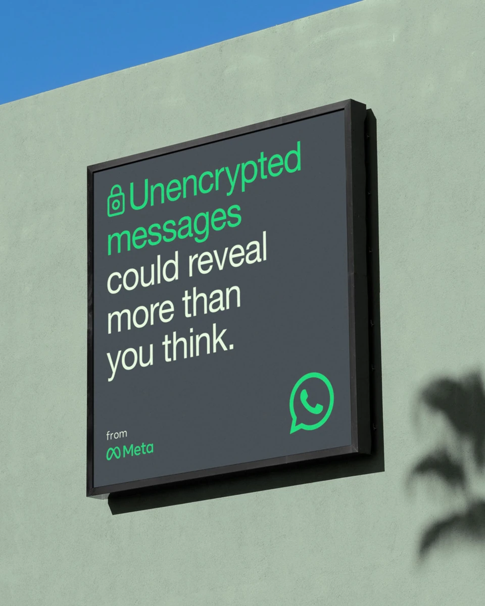 WhatsApp billboard on a green wall: 'Unencrypted messages could reveal more than you think'