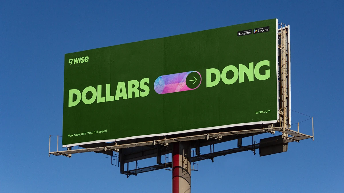 Valla publicitaria de Wise: «Dollars ⇄ Dong» contra un cielo azul