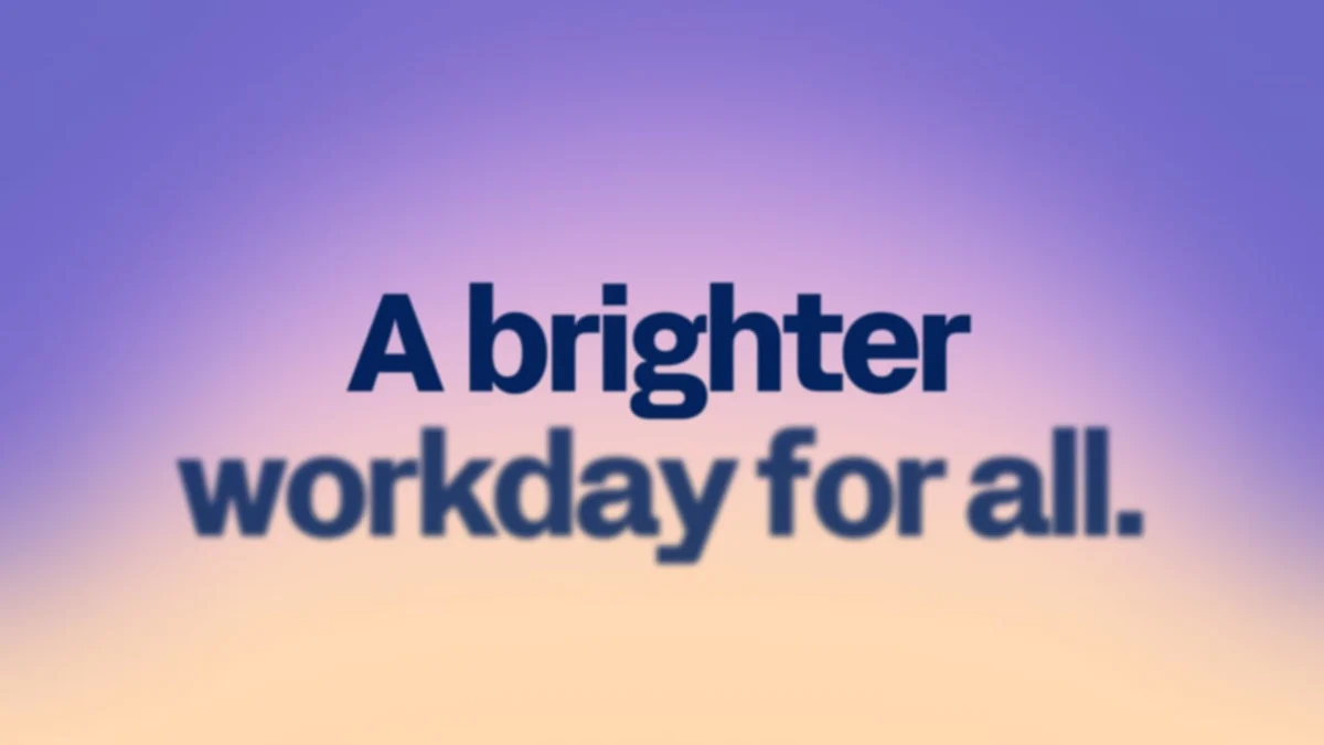 «A brighter workday for all.» sobre un degradado morado